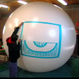 Inflatable sphere with vinyl branding