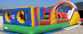 Obstacle course with slide